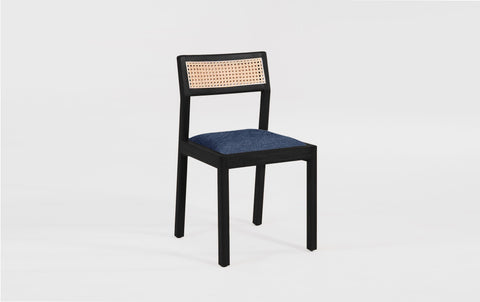 reddie-raw dining chair Rita Rattan Dining Chair