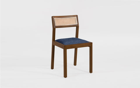 reddie-raw dining chair Rita Rattan Dining Chair