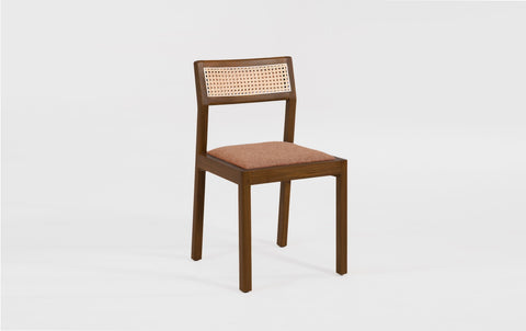 reddie-raw dining chair Rita Rattan Dining Chair