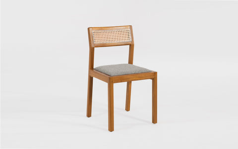 reddie-raw dining chair Rita Rattan Dining Chair