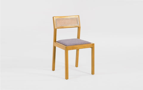 reddie-raw dining chair Rita Rattan Dining Chair