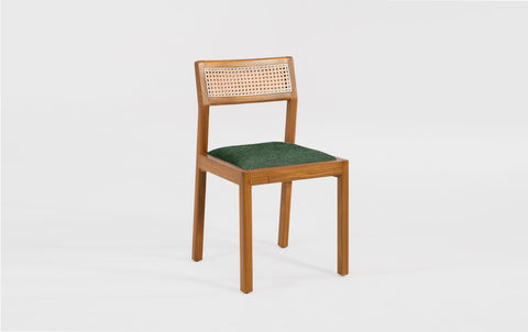 reddie-raw dining chair Rita Rattan Dining Chair