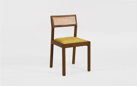 reddie-raw dining chair Rita Rattan Dining Chair